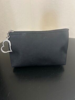Black Nylon Zippered Cosmetic Pouch with Rhinestone-Encrusted Heart Zipper Pull.